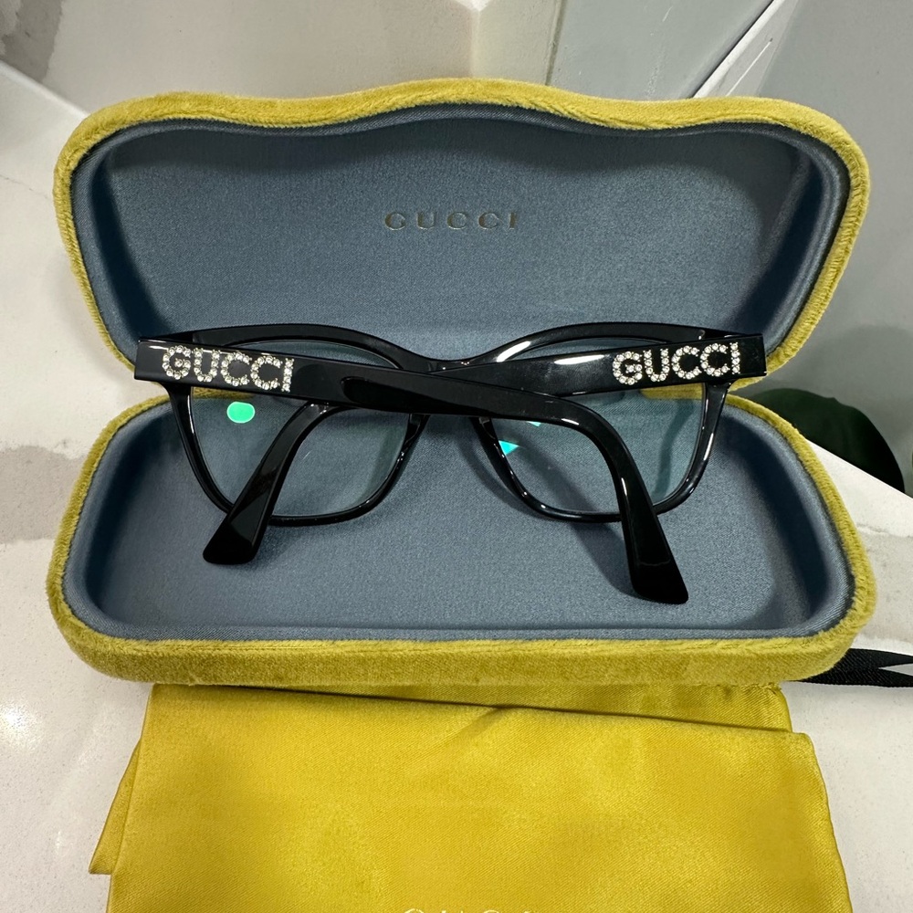 Gucci Women's Black Glasses with Yellow Case